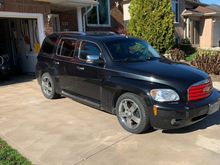 This look is just red rattle can paint on the grille and a chrome strip at the belt line