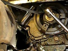 I’m going to suggest just the pry bar to hold the crank from turning, you shouldn’t need the socket and breaker bar , these photos are from removing and replacing the harmonic balancer
