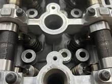 See them hiding under the camshafts 