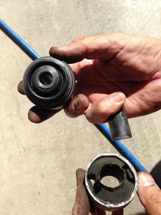 Two piece OEM bushing in the left, replacement Moog K200792 bushing in the right. Resolved my twitchy steering issue!