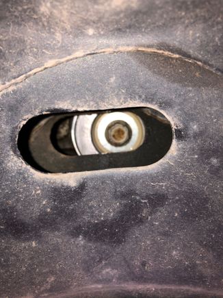 The tensioner mounting bolt should be in the centre of the slotted hole.