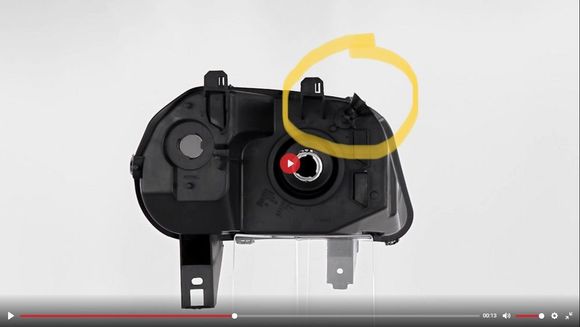The adjuster on the driver’s side headlight 