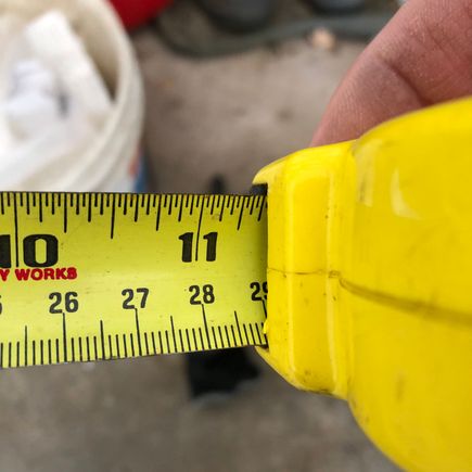 I measured with two hands and locked the tape measure 11 5/16 inches