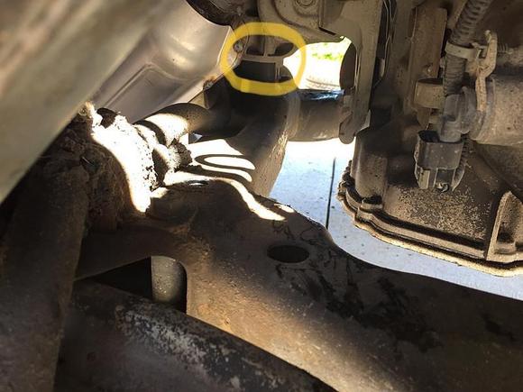 This is from the passenger side with the steering rack removed to see the rear transmission mount on the cradle bracket, there in that circle highlighted 