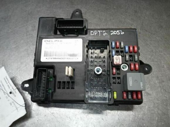 A look under the orange plug, we see the metal threaded nut, which might be loose.