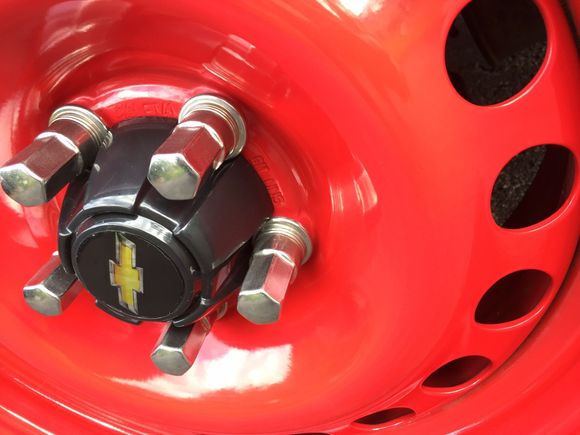 Red powder coat , Pontiac Trans AM lug nut covers and Toyota truck centre caps