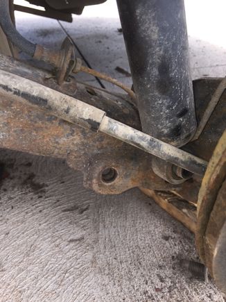 Lower shock bolt removed