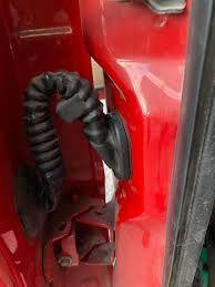 I suggest you pop it out, clean the foam off and reinstall it with some silicone grease around the opening to allow easier installation and some water protection 