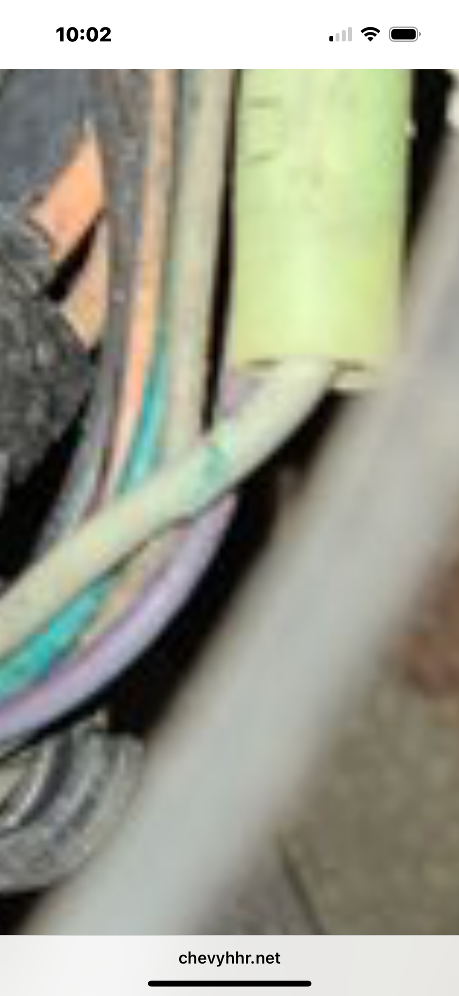 That does look like a cut in that grey wire . The black larger wire doesn’t look to belong to that harness