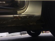 Closer look at the corrosion on the rear side. After the garage had looked on the problem area.