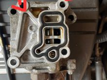 Still leaks at these points. Why would there be oil in the chamber between the arrows. The chamber is outside the seal so it seems there should be no oil in there. 