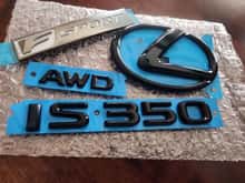 I ended up only installing the IS 350 AWD Logo, black lexus logo didnt fitm and want a black and white f sport logo