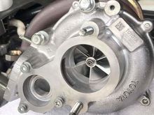 JRC’s modified turbo; clearly has a bigger compressor wheel. 