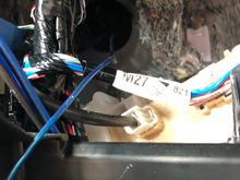 This is the access behind the last picture.  There is a hole provided to run wire on the right where my blue lead wire is, problem is the other side is sealed and impossible to access without blood loss..