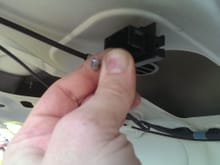 pull emergency release cable out with left hand