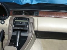 Black glove box to match the newer dash's modified upper left mounting point, but with the tan door/cover swapped over.