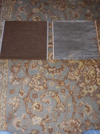 OEM filter on the left. The darker color suggests denser activated charcoal 