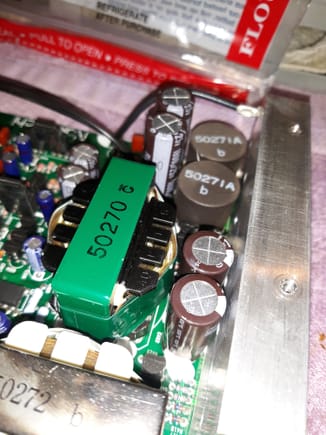 1,800 and 2,200 microfarad capacitors shown..
Nakamichi used glue at the base...
