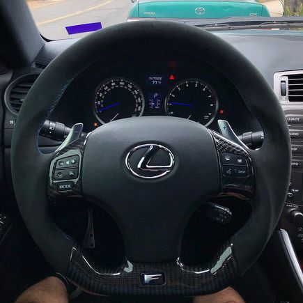 I know no one looks at my thread but umm here’s a picture of my new steering wheel. Carbon/Alcantara 