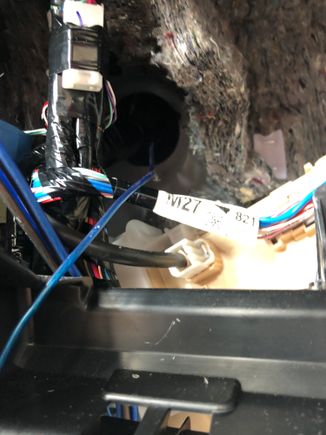 This is the access behind the last picture.  There is a hole provided to run wire on the right where my blue lead wire is, problem is the other side is sealed and impossible to access without blood loss..