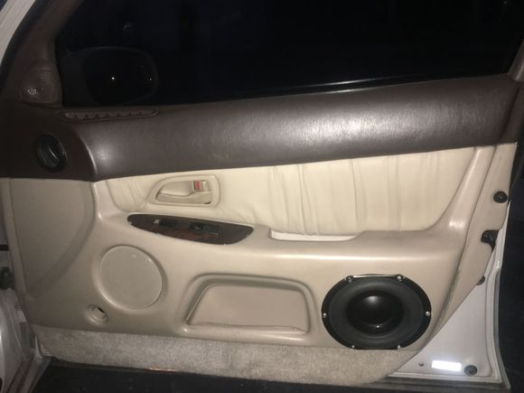 96-97? Custom cutout door panel.
Allows for a 3-way sound stage for the front of the car. Dedicated Highs, Mids, and Lows. The woofer shown/included is the Peerless SLS-P830946 (also known as the Vifa 6-39/04).