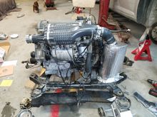 Made a new "air-box" out of radiation barrier to keep hot engine bay air out of my intake.