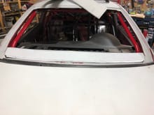 The white piece at the lower window edge is a dashboard modification needed because the firewall was pushed back into the interior several inches. This will be painted black.