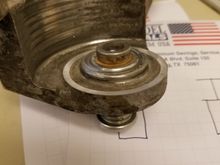 Machined the "dust-ridge" down so now I can use any tensioner pulley