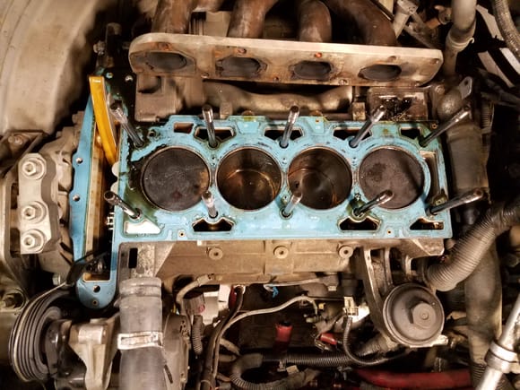 So I used a Fel-Pro gasket and it blew it's seal on cylinder 1.  The oil you see in this picture is from me doing a compression test prior.  Which btw if you use too much oil to test the rings it can give you a false positive with a blown head gasket as well.
