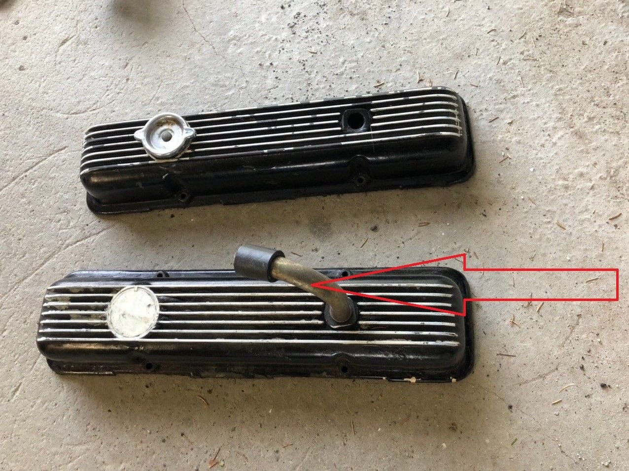 How do i get the aluminum grommet out of the valve covers