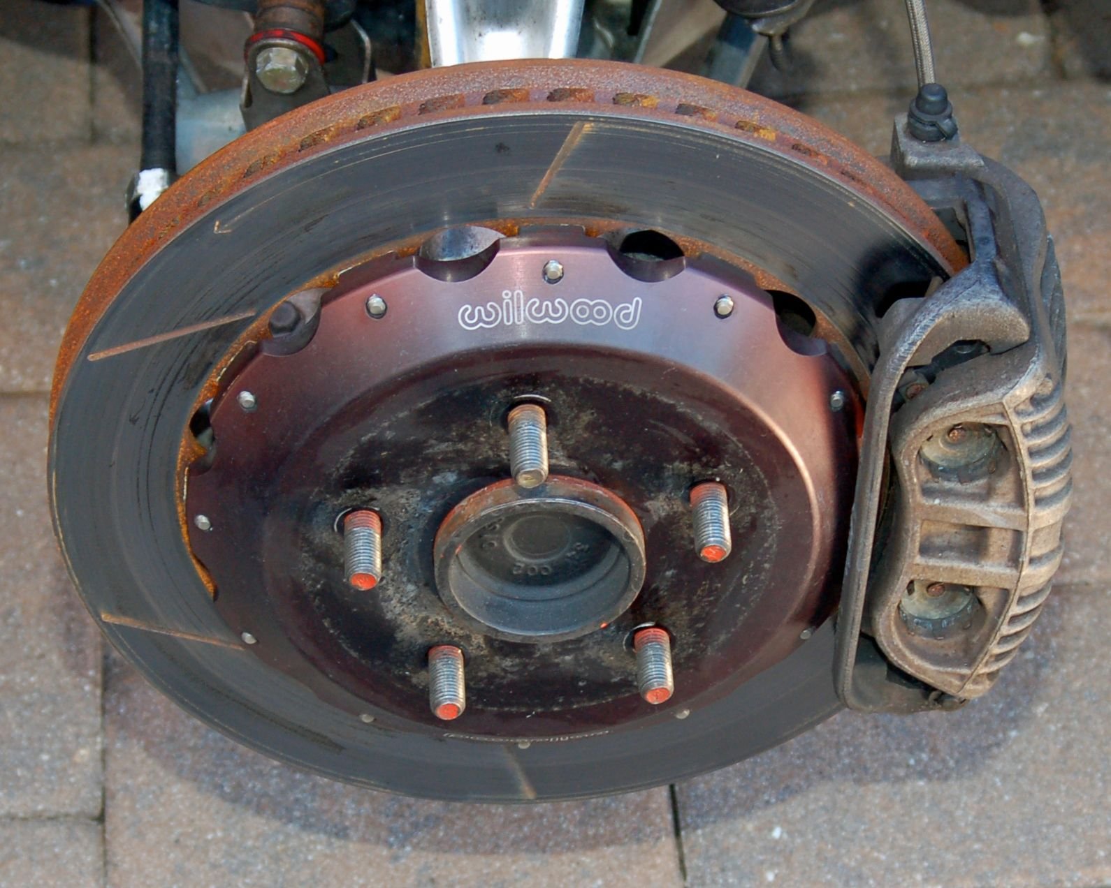 Replacing (warped) rotor is it a must to replace pads too