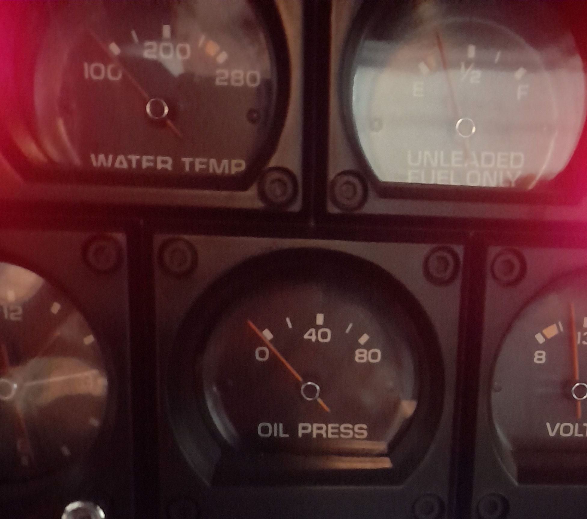 Key on. Not started. Oil pressure shows a tad below zero. Actually I never really noticed this before. Temp gauge dropped down as well and volt gauge comes up to voltage. This is normal. 