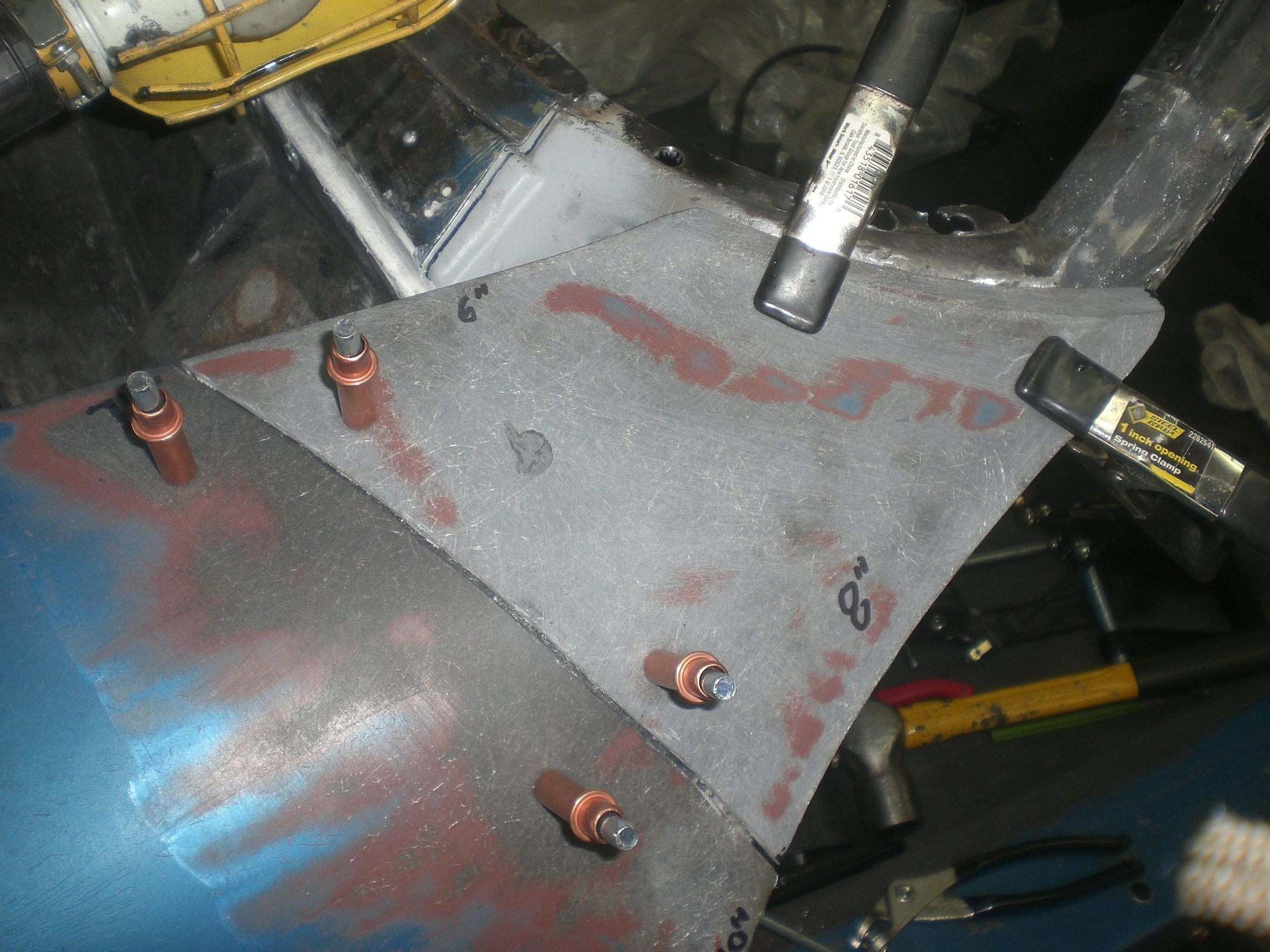 Then cut fender clip with support structure clamped underneath was clecod in place 