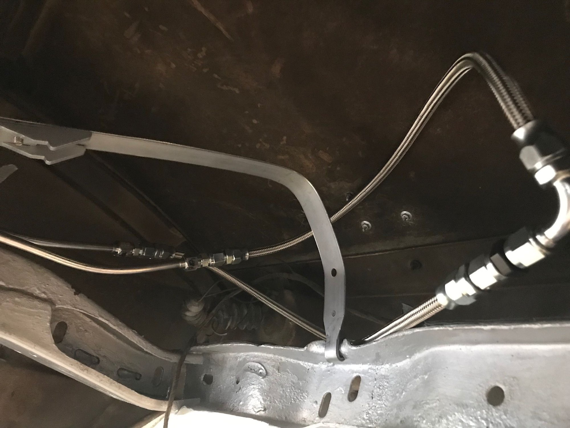 I replaced my fuel tank with an EFI tank with in-tank pump. I connected the two flex lines temporarily for the pressure/leak test. As I said earlier, if your current fuel line is good, just use the Holley in-tank solution and avoid all of this!