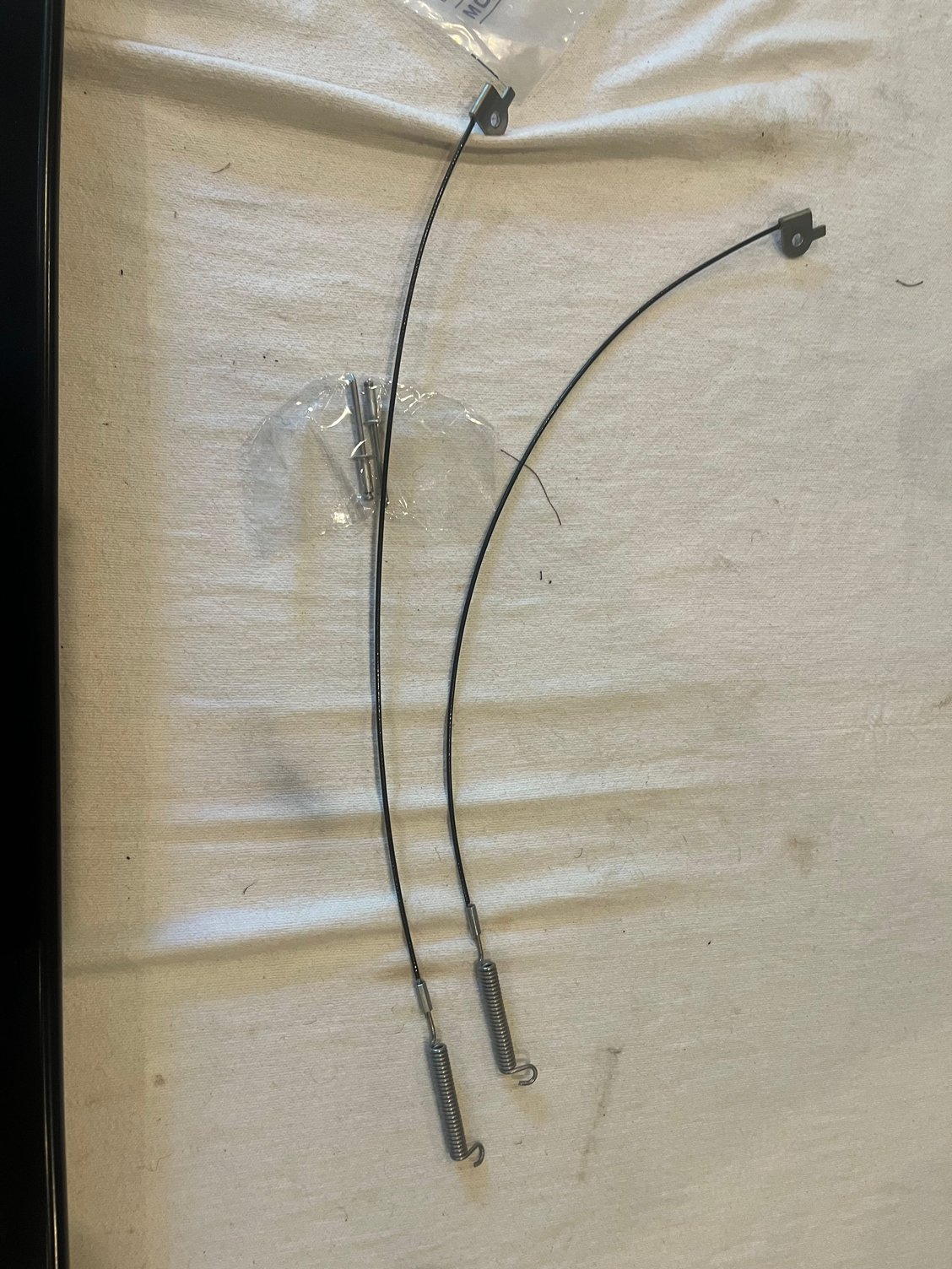 72 might be different. Here is what my cables look like. I see where the back of the cable goes but I don�t see where the spring end goes exactly. I do know it goes to the front header of the top somewhere 🤷‍♂️