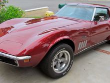 Side view, showing American Racing 200S rims.
