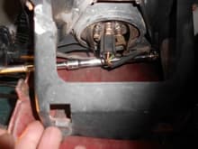 Removal of the light and cover are straight forward.  Just look at it, and youcan remove it.

Unclip the wiring harness from the light, then insert a socket and eztension to remove bolt as shown.