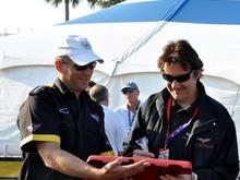 Paul getting Ron Fellow's signature on the engine cover