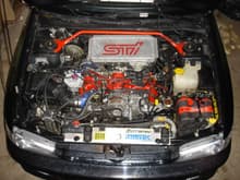 2.5 RS-STI Swap. This engine was never sold in the United States. It is an 8250RPM Redline Japanese EJ207; 2Litre Turbocharged Flat 4. Mods are to many to list... All internals are forged and balanced, the crank is nitrided, the pistons, exhaust headers, turbocharger turbine, up pipe, downpipe are all ceramic coated, all ports are gasket ported and gasket matched, etc..