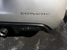 view of the black lettering added to the corvette logo