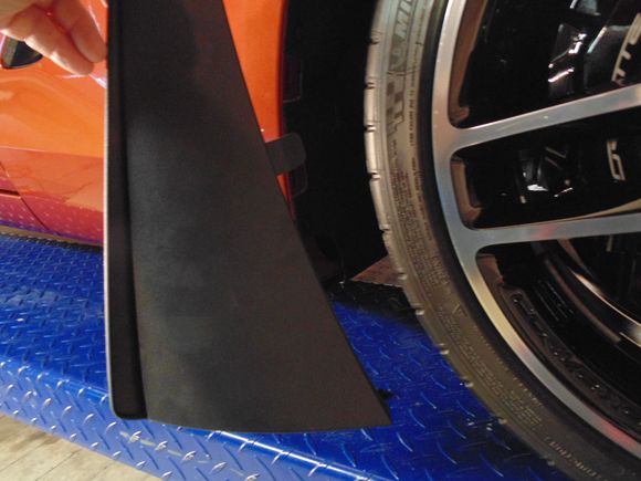 Snap in new wider front guard.  Tab goes into slot in the wheel well. (Right front)