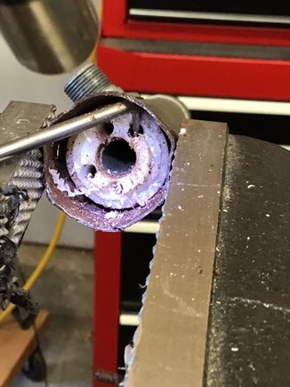 And a little hammer on the tore up metal prying out