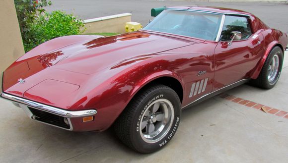Side view, showing American Racing 200S rims.