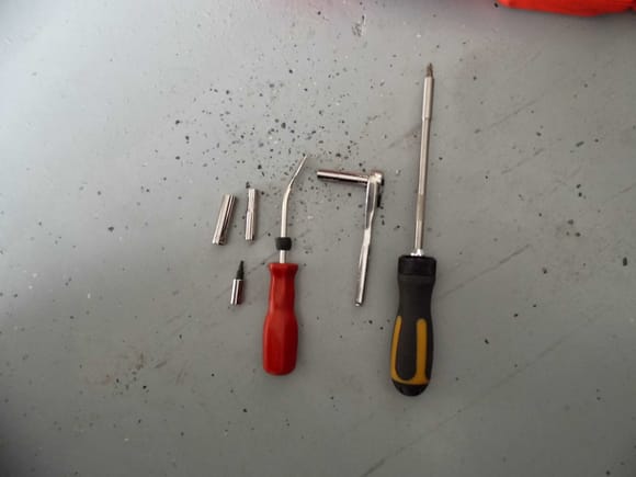Here is all the tools needed to remove either left or right front fenders. 
1. Phillips screwdriver 
2. 7mm, 10mm and 9/32 deep well socket and ratchet.
3. Fastener removal tool
4. T-15 torx