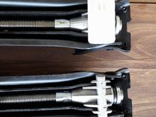 The top jack is from my Mercedes CLK320. The bottom jack is from my Crossfire. Looks like  I am missing the white plastic cap, which makes a big difference when jacking up the car. Anyone know the part number for the plastic cap? Assuming that it is possible to buy just that of course.....!
