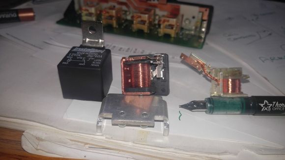 Showing the FET transistor heat sink ( wont work) under the new relay and on the right the old relay for comparison