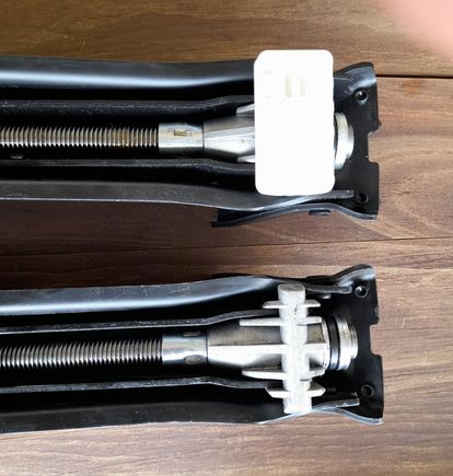 The top jack is from my Mercedes CLK320. The bottom jack is from my Crossfire. Looks like  I am missing the white plastic cap, which makes a big difference when jacking up the car. Anyone know the part number for the plastic cap? Assuming that it is possible to buy just that of course.....!
