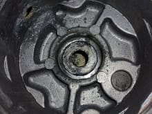 The rubber drain boot failed, and caused all the gunk to sit in the corner, and you can see how the moisture infiltrated and gunked up the metal