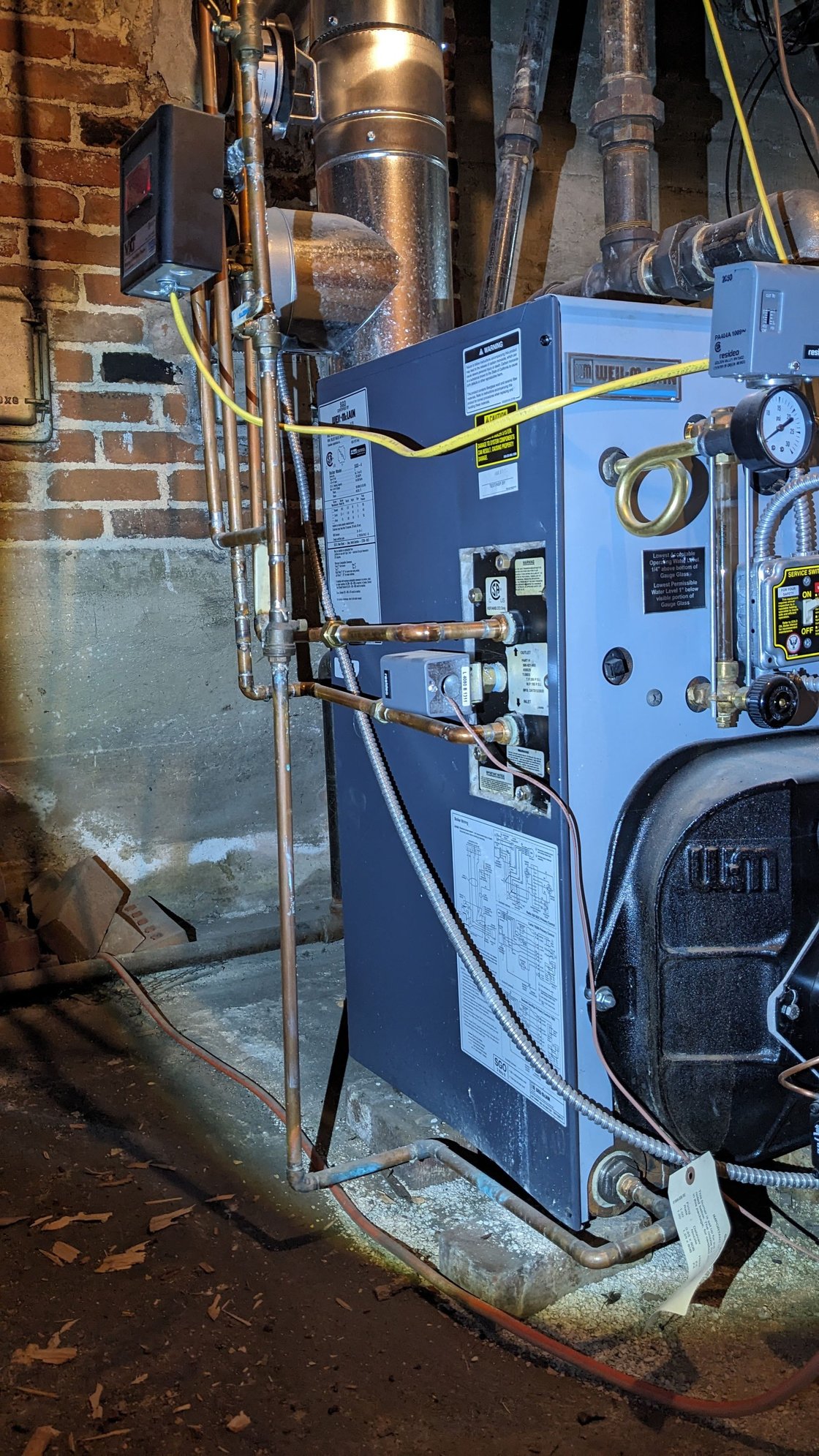 Two of 4 upstairs radiators not getting hot water