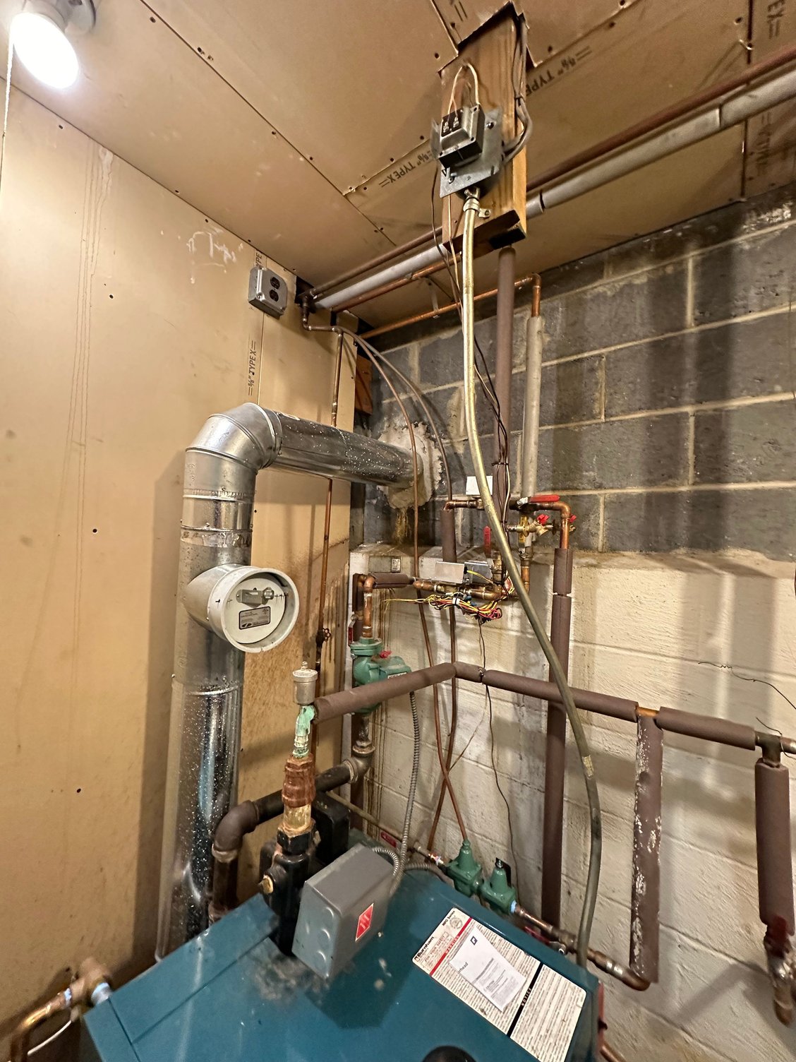 How can I flush my baseboard heating system